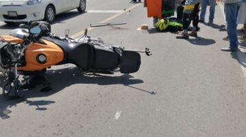 Motorcyclist collides with car at Walmart intersection