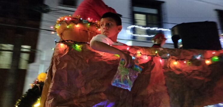 Ajijitecan families light up Christmas parade