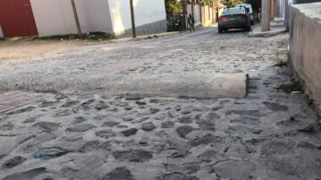 Juan Pablo II Street getting access to water Neighbors have been sharing access