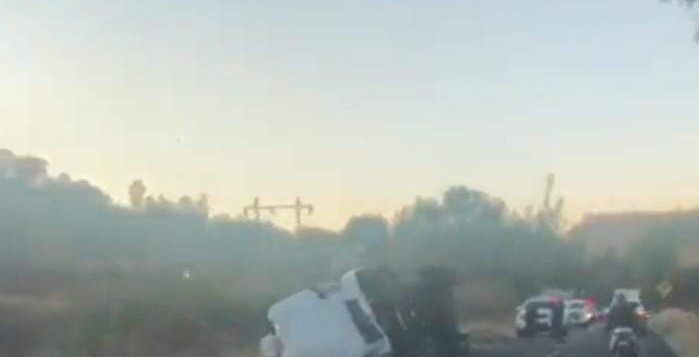 Tandem rig tractor trailer overturns in El Molino