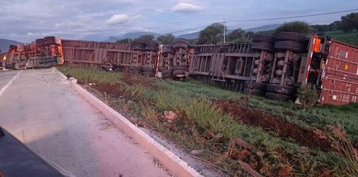 Truck overturns on a highway bypass crossing