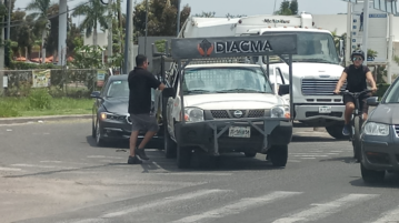 BMW rear ends delivery truck at Walmart intersection