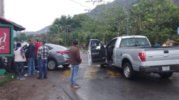 Car rear-ended on wet pavement in San Juan Cosalá