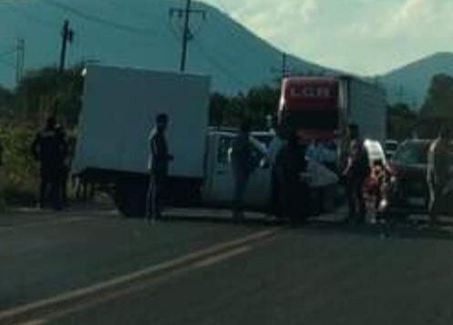 Cargo truck and private vehicle collide