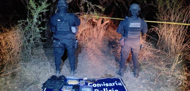 Police secure a camp with drugs and tactical equipment in Mazamitla