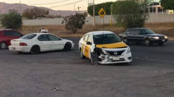 Early morning hit- and- run damages taxi