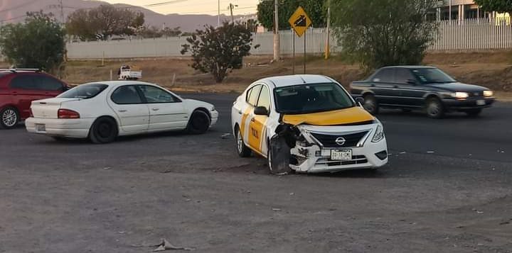 Early morning hit- and- run damages taxi