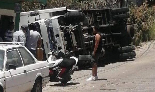 Another truck tips on uneven Jocotepec street