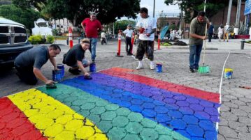 Crosswalk painted with rainbow colors of diversity