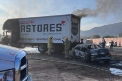 Car and freight truck crash, burst into flames on highway