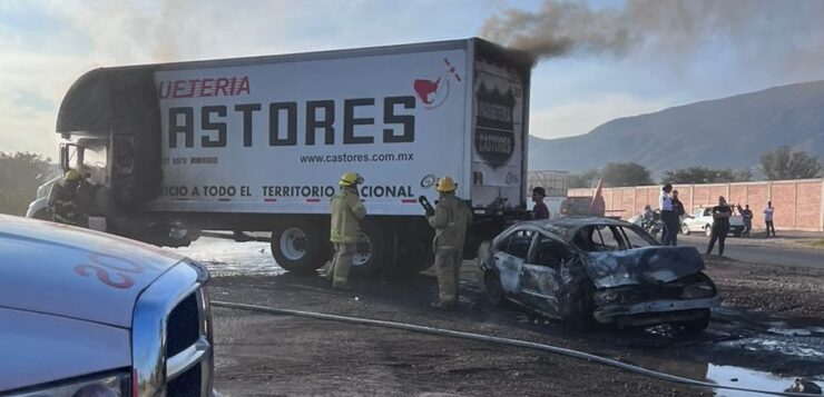 Car and freight truck crash, burst into flames on highway