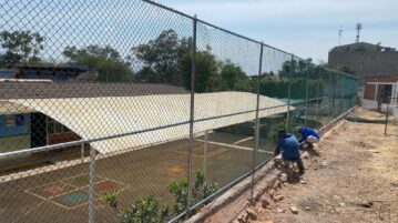 Wall between CETAC and Aurelia Flores schools removed Leaning wall was replaced with a chain-link fence Wall between CETAC and Aurelia Flores schools removed