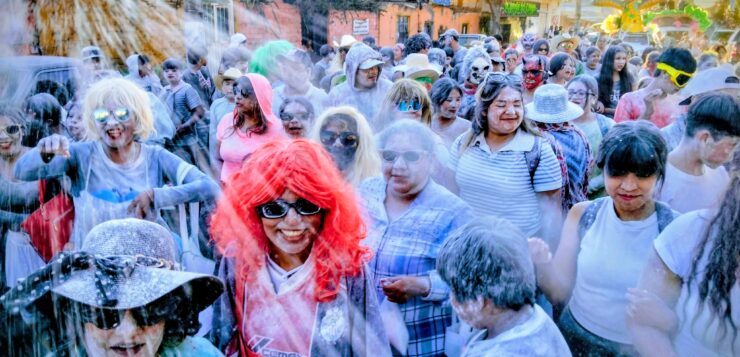 Youth shine through the flour at San Juan Cosalá carnival