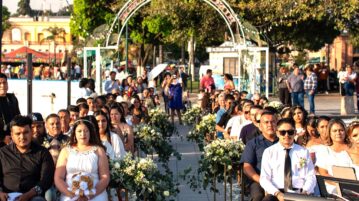Twenty-one couples celebrate unions in group wedding ceremony