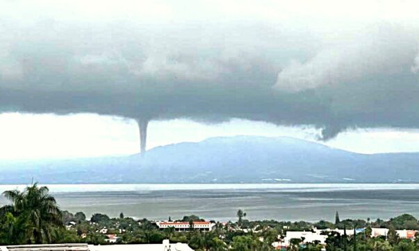 Waterspout from hillside above the lake. Photo: Elisa Moeton Heard from Facebook